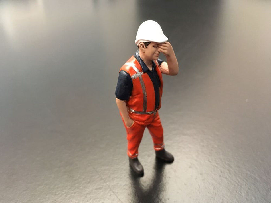 AT Collections 1:32 Scale Worker scratching head Orange safety jacket with helmet